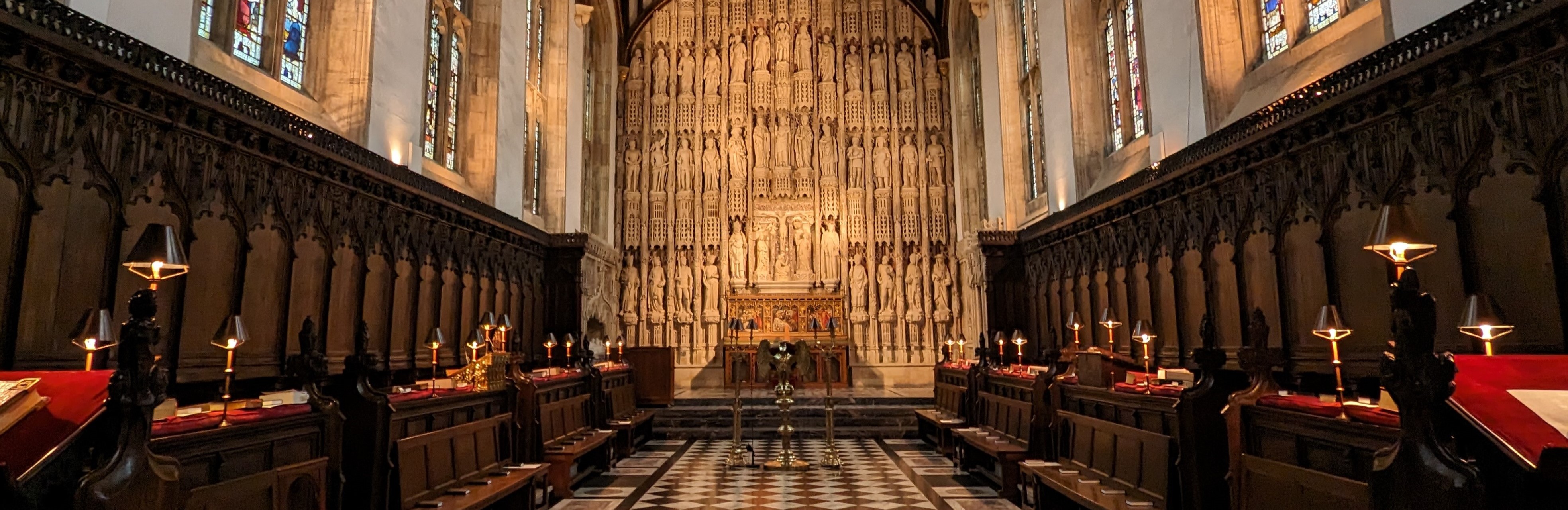 A view down the length of the chapel to the ornate reredos